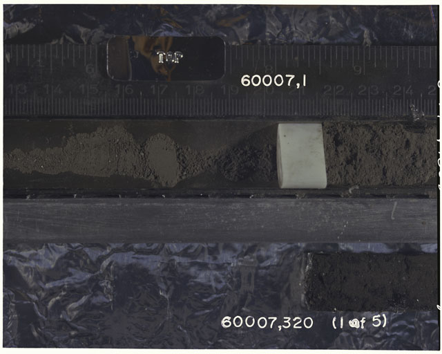 Color photograph of Apollo 16 Sample(s) 60007,1,320; 1 OF 5 Processing photograph displaying Core with peel at 13-24 cm depth.