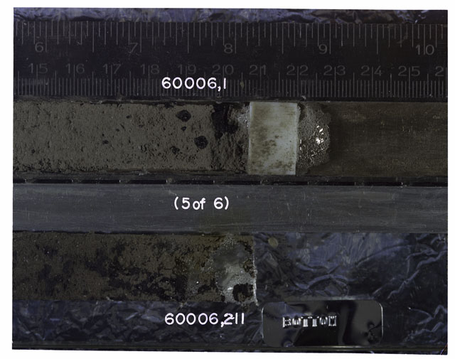 Color photograph of Apollo 16 Sample(s) 60006,1,211; 5 OF 6 Processing photograph displaying Core Tube with peel at 14.5-25.5 cm depth.