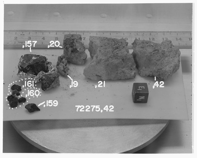 Black and white photograph of Apollo 17 Sample(s)72275,19-21,42,157,159,160,161; Processing photograph displaying reconstruction with an orientation of E,N.