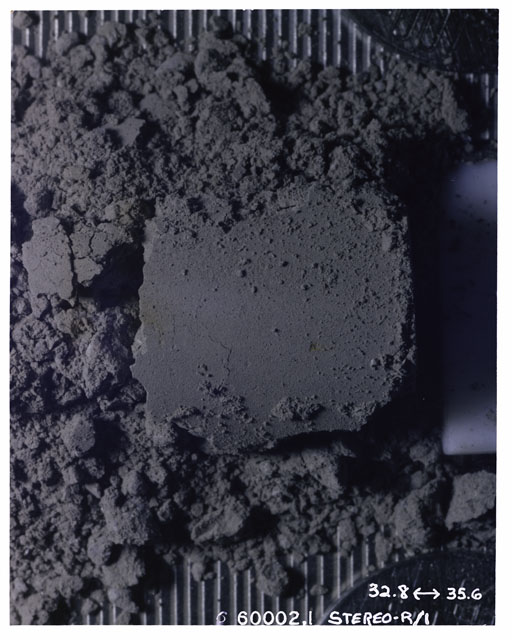 Color photograph of Apollo 16 Sample(s) 60002,1; Processing photograph displaying Core Tube at 32.8-35.6 cm depth.
