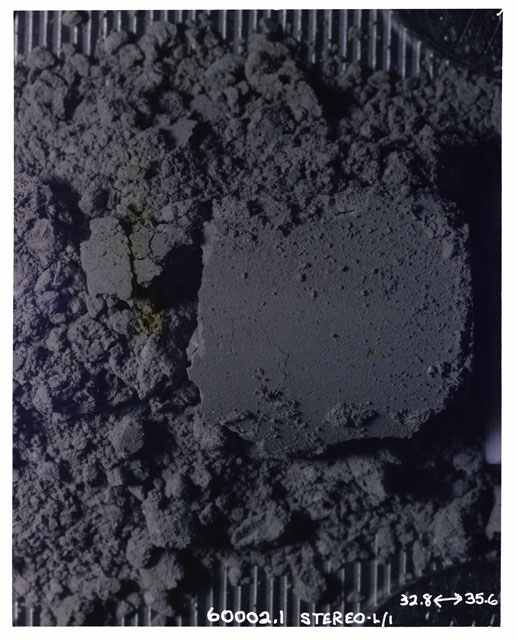 Color photograph of Apollo 16 Sample(s) 60002,1; Processing photograph displaying Core Tube at 32.8-35.6 cm depth.
