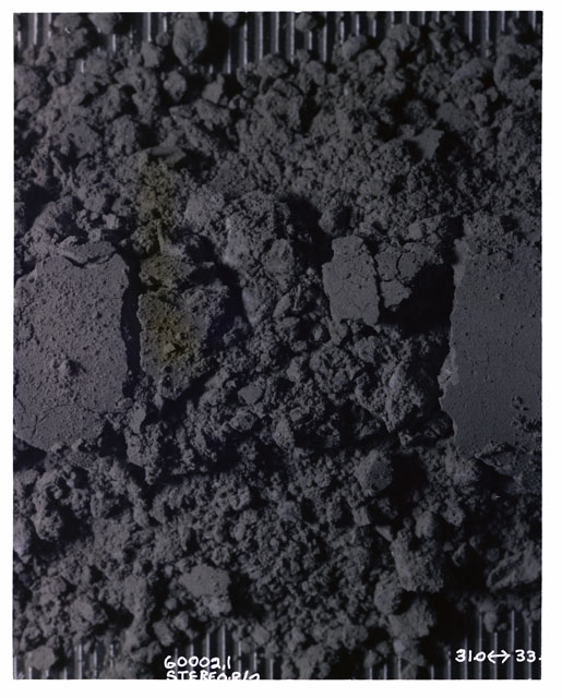 Color photograph of Apollo 16 Sample(s) 60002,1; Processing photograph displaying Core Tube at 31-33 cm depth.