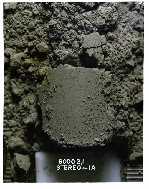 Color photograph of Apollo 16 Core Sample 60002,1; Processing photograph displaying Core Fines .
