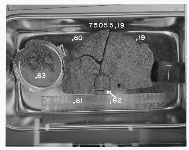 Black and white photograph of Apoll 17 Rake Sample(s) 75055,19,60-63; Processing photograph displayng the orientation of a Cow Cake reconstruction.