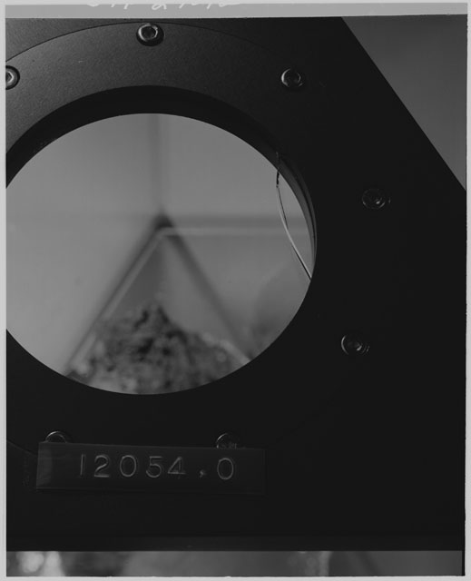 Black and white Processing photograph of Apollo 12 Sample(s) 12054,0 of a top Display Sample.