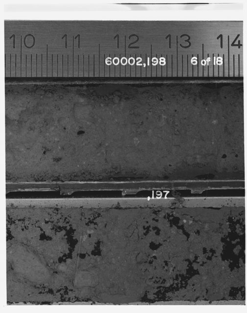 Black and white photograph of Apollo 16 Sample(s) 60002,197,198; 6 of 18 Processing photograph displaying Core Tube with peel at 10-14 cm depth.
