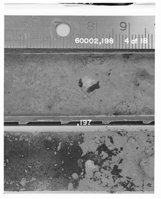 Black and white photograph of Apollo 16 Sample(s) 60002,197,198; 4 of 18 Processing photograph displaying Core Tube with peel at 5.5-10 cm depth.