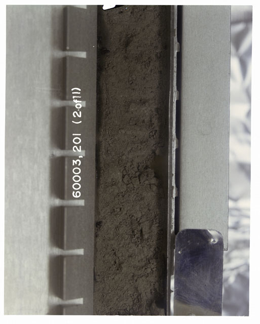 Black and white photograph of Apollo 16 Sample(s) 60003,201; 2 of 11 Processing photograph displaying pre-impregnation Core Tube .
