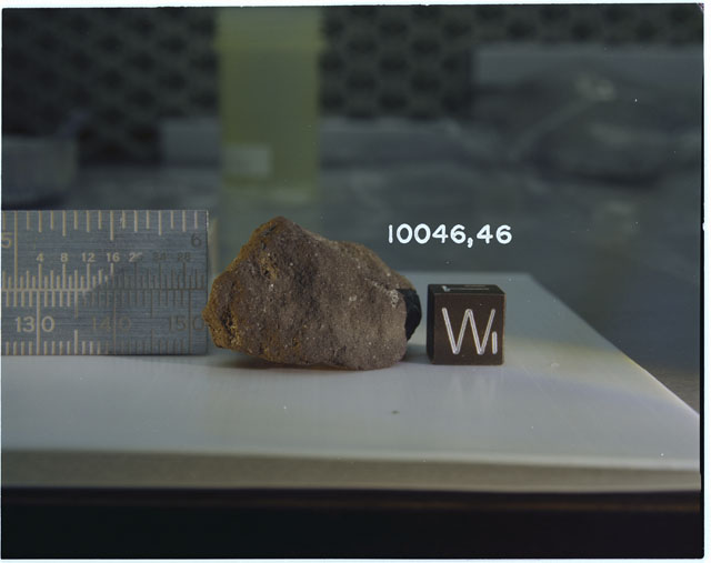 Color photograph of Apollo 11 Sample(s) 10046,46; Processing photograph displaying an orientation of W.
