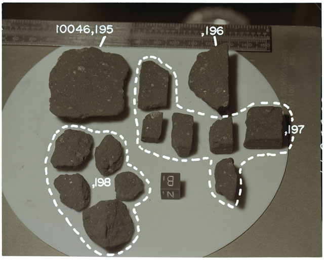 Color photograph of Apollo 11 Sample(s) 10046,195-198; Processing photograph displaying post cut group with an orientation of B,N.