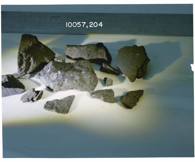 Color photograph of Apollo 11 Sample(s) 10057,204; Processing photograph displaying post chip group.