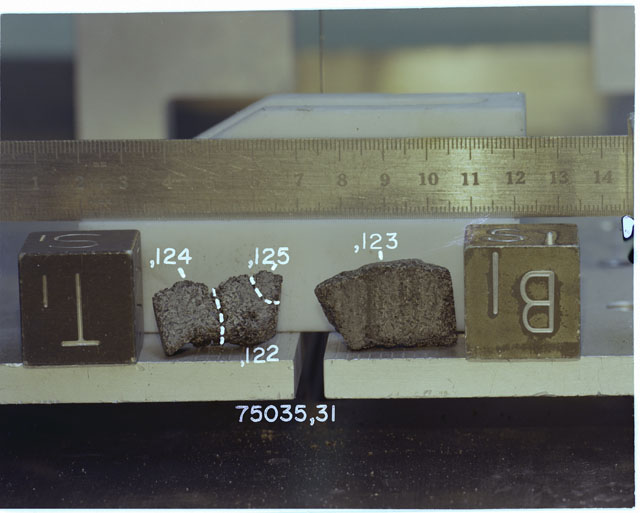 Color photograph of Apollo 17 Sample(s) 75035,31,122-125; Processing photograph displaying the orientation of pie shot reconstruction.