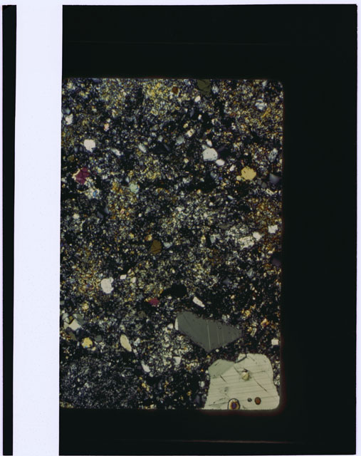 Color photograph of Apollo 17 Sample(s) 76015; Thin Section photograph using cross nichols light.