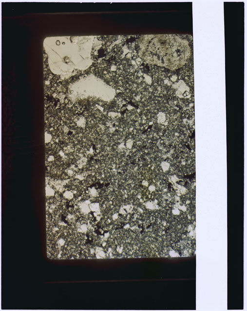Color photograph of Apollo 17 Sample(s) 76015; Thin Section photograph using reflected light.