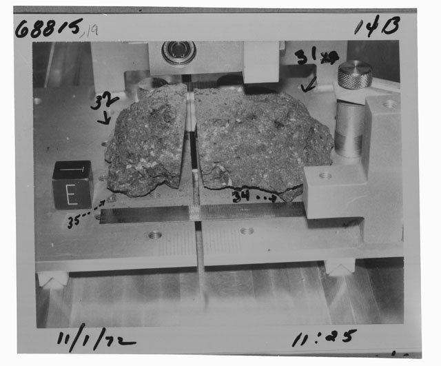 Black and white photograph of Apollo 16 Sample(s) 68815,19,31,32,34,35; Processing photograph displaying post cutting with an orientation of E,T.