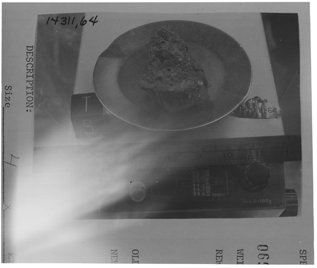 Black and white photograph of Apollo 14 Sample(s) 14311,64; Processing photograph displaying weighing  of sample with an orientation of T,S.
