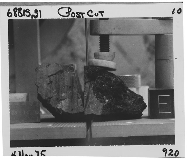 Black and white photograph of Apollo 16 Sample(s) 68815,31; Processing photograph displaying post cutting with an orientation of E.