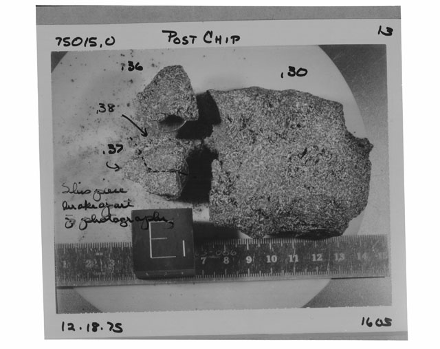 Black and white photograph of Apollo 17 Sample(s) 75015,30,36-38; Processing photograph displaying  post chip sample with an orientation of E.