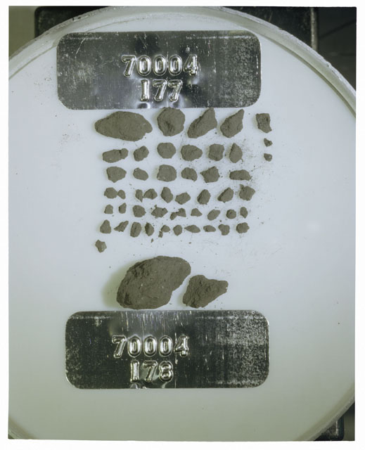 Color photograph of Apollo 17 Sample(s) 70004,177,178; Processing photograph displaying a group of >1 MM Core Fines found at 200.2-200.7 cm depth from surface.
