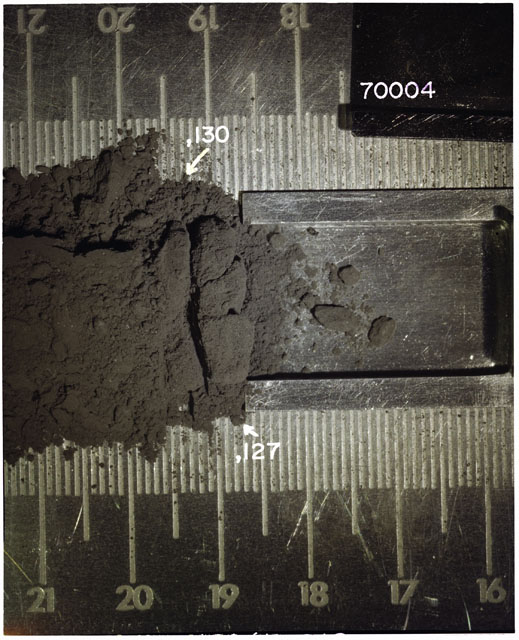 Color photograph of Apollo 17 Sample(s) 70004,127,130; Processing photograph displaying Core Fines in s at 19-20 cm depth.