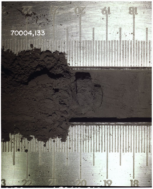 Color photograph of Apollo 17 Sample(s) 70004,133; Processing photograph displaying Core Fines in s at 20 cm depth.