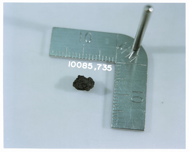 Color photograph of Apollo 11 Sample(s) 10085,735; Processing photograph displaying >1 MM fines .