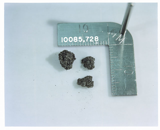 Color photograph of Apollo 11 Sample(s) 10085,728; Processing photograph displaying >1 MM fines group.