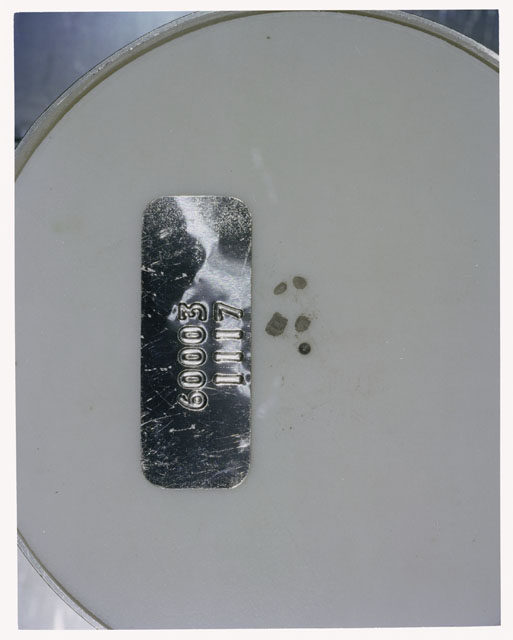 Color photograph of Apollo 16 Core Sample 60003,1117; Processing photograph displaying >1 MM Core Fines .