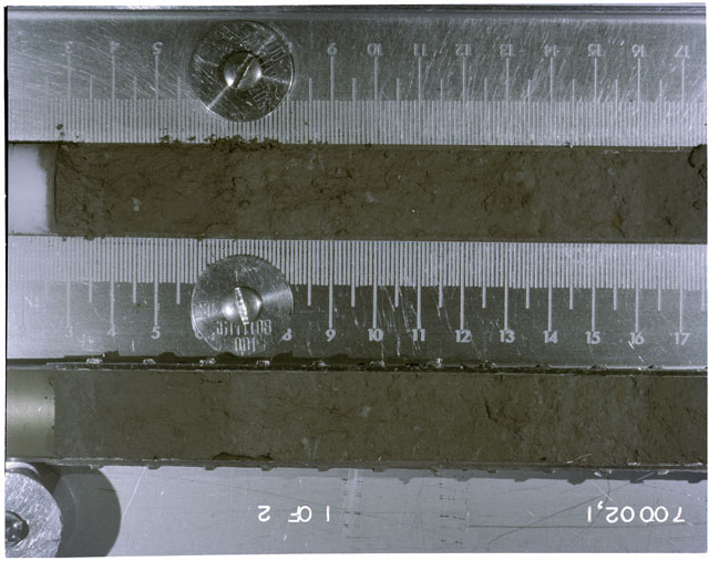 Color photograph of Apollo 17 Sample(s) 70002,1; 1 of 2 Processing photograph displaying pre-dissection Core at 3-17 cm.