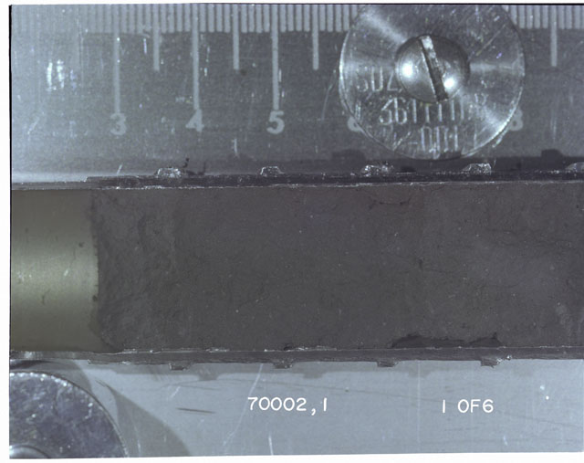 Color photograph of Apollo 17 Sample(s) 70002,1; 1 of 6 Processing photograph displaying Core at 3-8 cm.