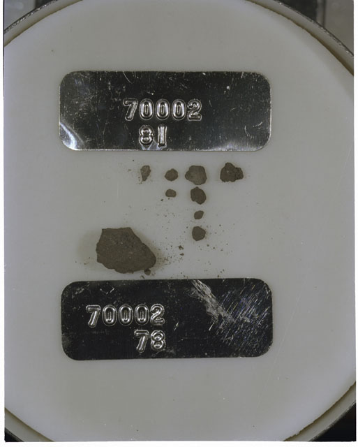 Color photograph of Apollo 17 Sample(s) 70002,78,81; Processing photograph displaying a group of >1 MM Core Fines.