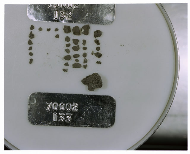 Color photograph of Apollo 17 Sample(s) 70002,132,133; Processing photograph displaying a group of >1 MM Core Fines.