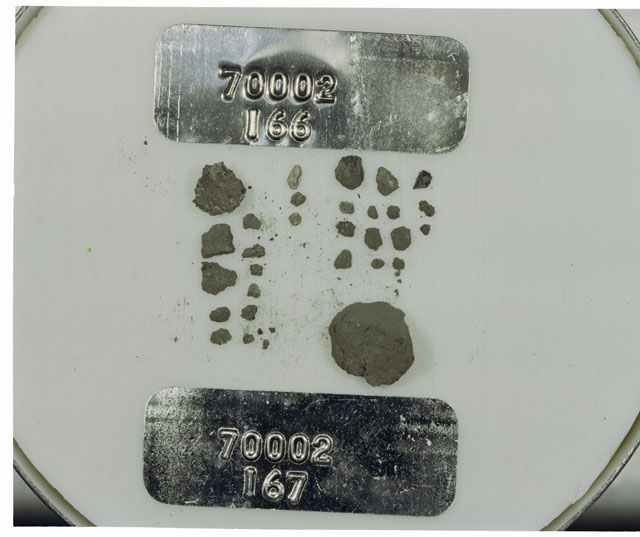 Color photograph of Apollo 17 Sample(s) 70002,166,167; Processing photograph displaying a group of <1 MM Core Fines.