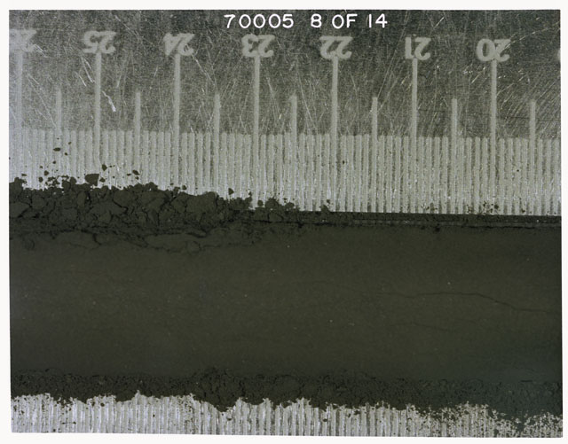 Color photograph of Apollo 17 Sample(s) 70005; 8 of 14 Processing photograph displaying pre-dissection Core at 19.5-25.5 cm.