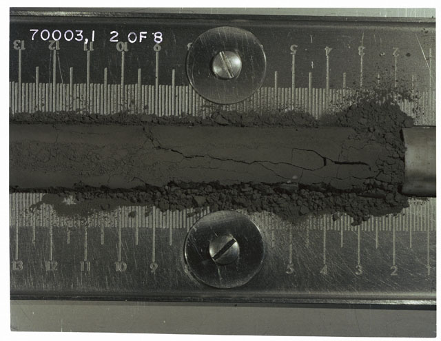 Color photograph of Apollo 17 Sample(s) 70003,1; 2 of 8 Processing photograph displaying Core at 1.5-12.5 cm depth.