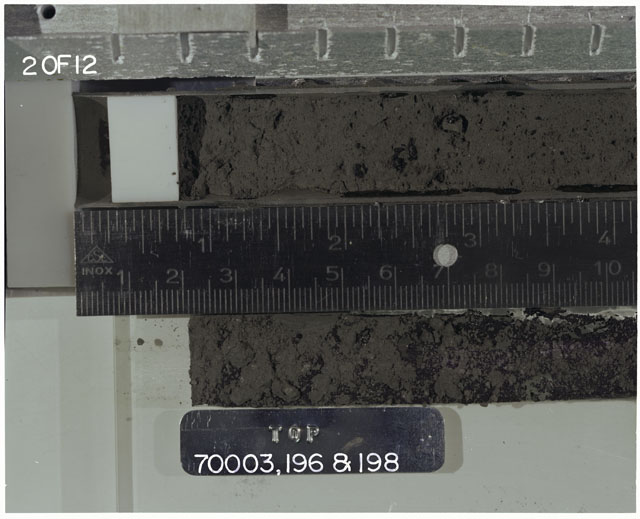 Color photograph of Apollo 17 Sample(s) 70003,196,198; 2 of 12 Processing photograph displaying Core with peel at 0-10 cm depth.