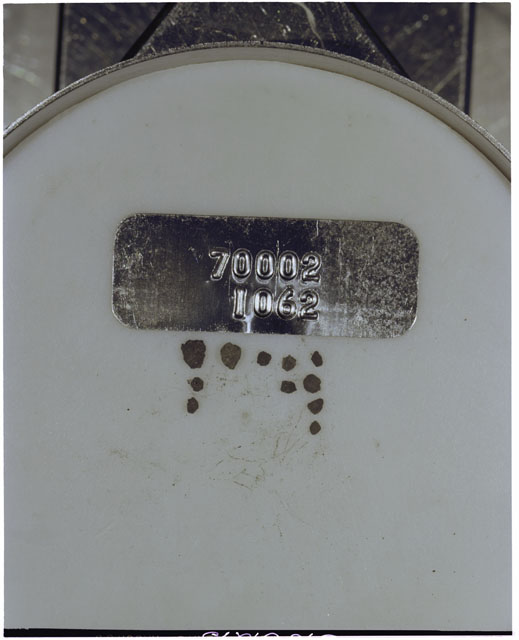 Color photograph of Apollo 17 Sample(s) 70002,1062; Processing photograph displaying a group of >1 MM Core Fines.