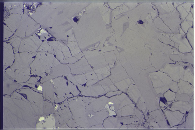 Color 1.4 MM Thin Section photograph of Apollo 14 Sample(s) 14053,13 using reflective light.