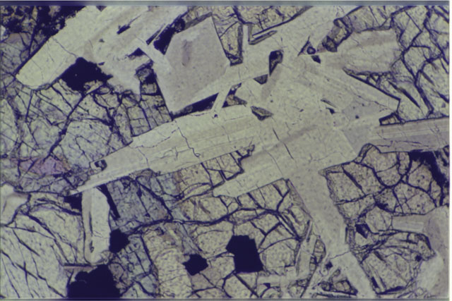 Color 1.4 MM Thin Section photograph of Apollo 14 Sample(s) 14053,13 using transmitted light.