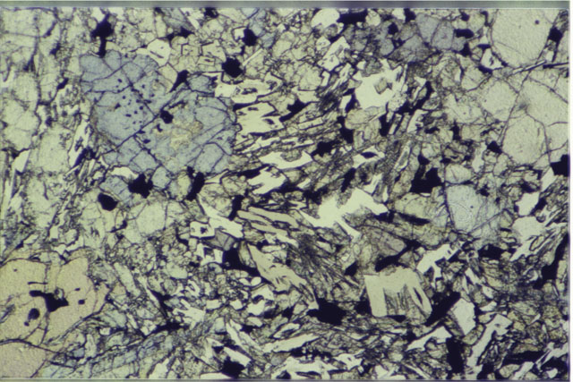 Color 2.7 MM Thin Section photograph of Apollo 12 Sample(s) 12002,162 using plane-polarized light.