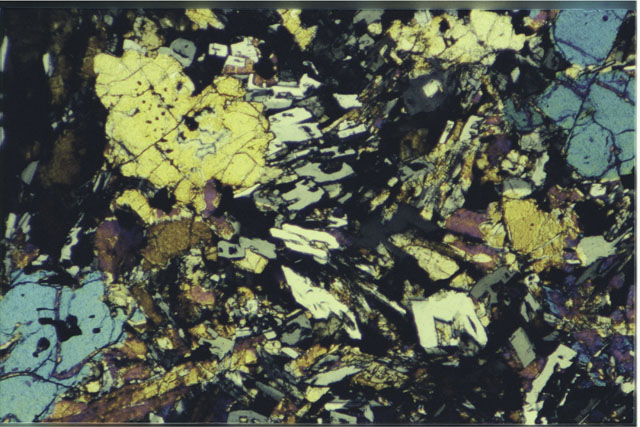 Color 2.7 MM Thin Section photograph of Apollo 12 Sample(s) 12002,162 using cross nichols light.
