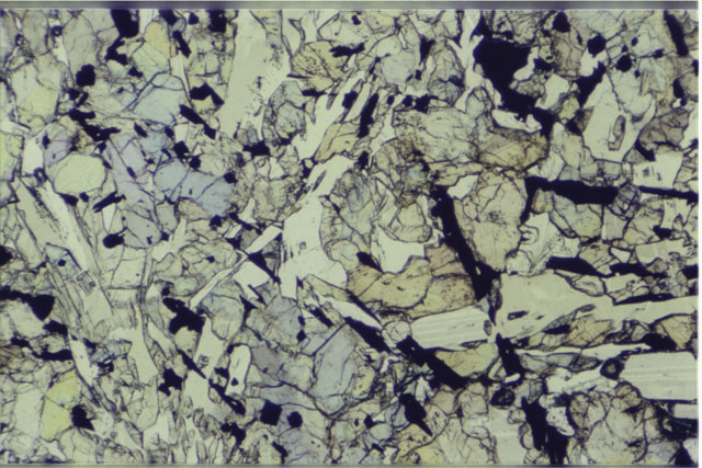 Color 2.7 mm Thin Section photograph of Apollo 12 Sample(s) 12063,5 using transmitted light.