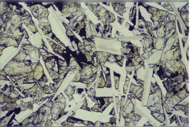 Color 2.7 MM Thin Section photograph of Apollo 12 Sample(s) 12051,54 using transmitted light.