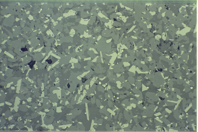Color photograph of Apollo 11 Sample(s) 10049,32; 0.69 MM Thin Section photograph using transmitted light.