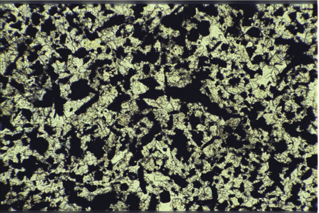 Color photograph of Apollo 11 Sample(s) 10049,32; 0.69 MM Thin Section photograph using reflected light.
