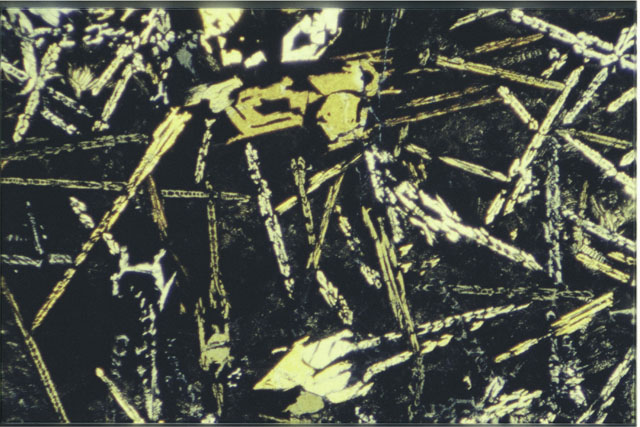 Color 2.7 MM Thin Section photograph of Apollo 12 Sample(s) 12009,6 using cross nichols light.