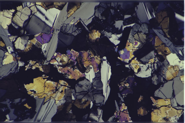 Color 2.7 MM Thin Section photograph of Apollo 17 Sample(s) 75055,47 using cross nichols light.