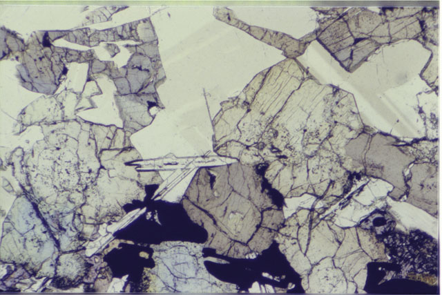 Color 2.7 MM Thin Section photograph of Apollo 12 Sample(s) 12064,8 using transmitted light.
