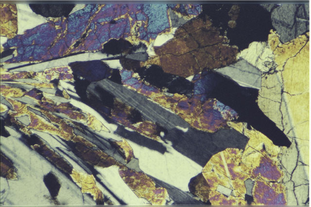 Color 2.7 MM Thin Section photograph of Apollo 12 Sample(s) 12039,6 using cross nichols light.