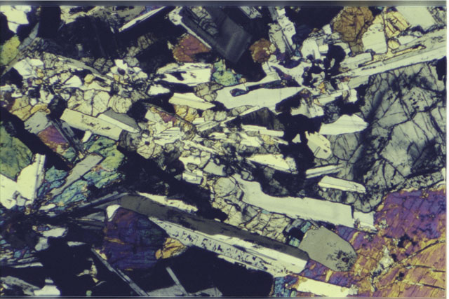Color 2.7 MM Thin Section photograph of Apollo 12 Sample(s) 12021,3 using cross nichols light.